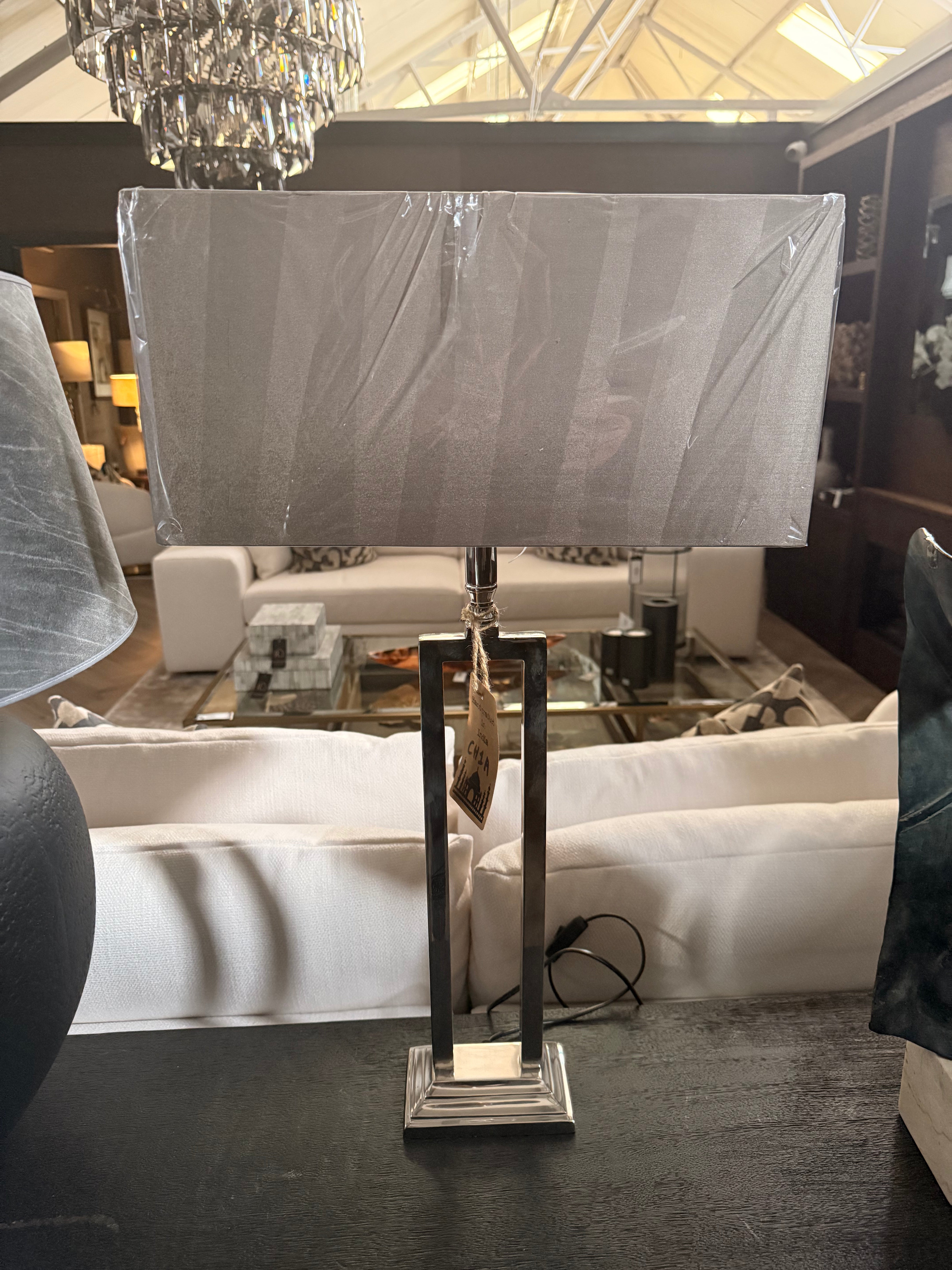 Kasmire tall nickel lamp w black shade . Buy Instore