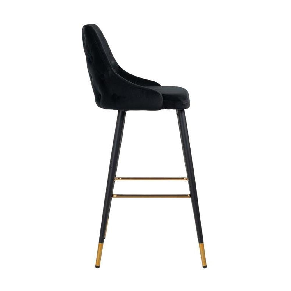 Black velvet bar stool with tufted back, black metal legs, and gold accents.