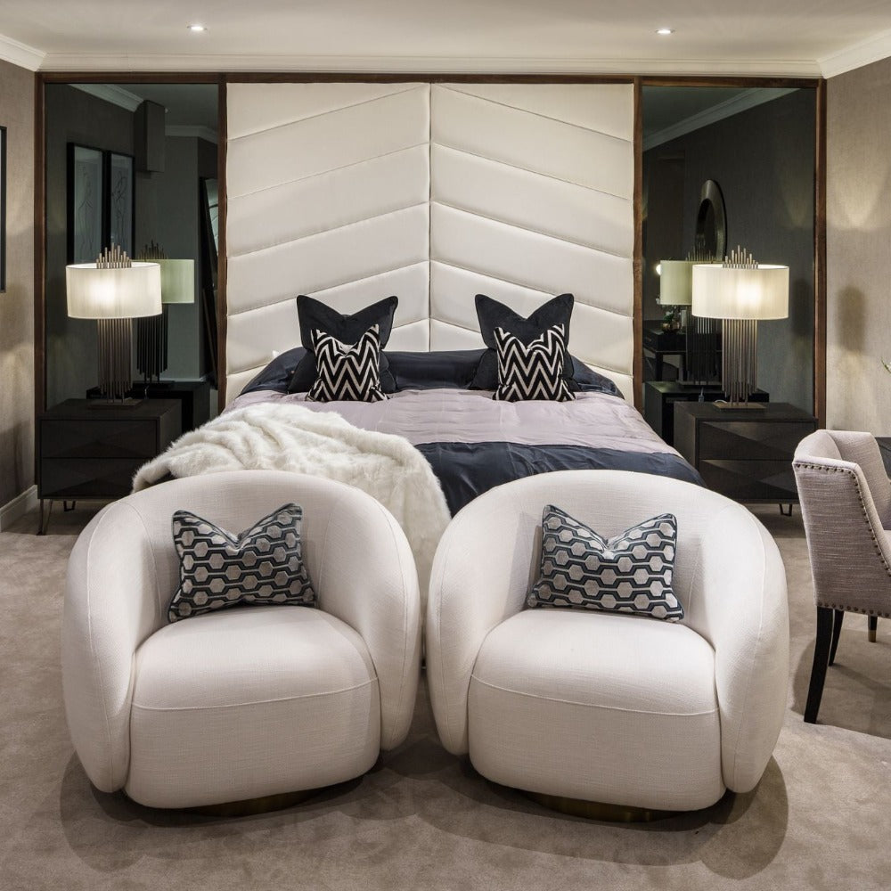 Amore swivel armchairs by Eichholtz in white Lyssa-Renaissance Design Studio