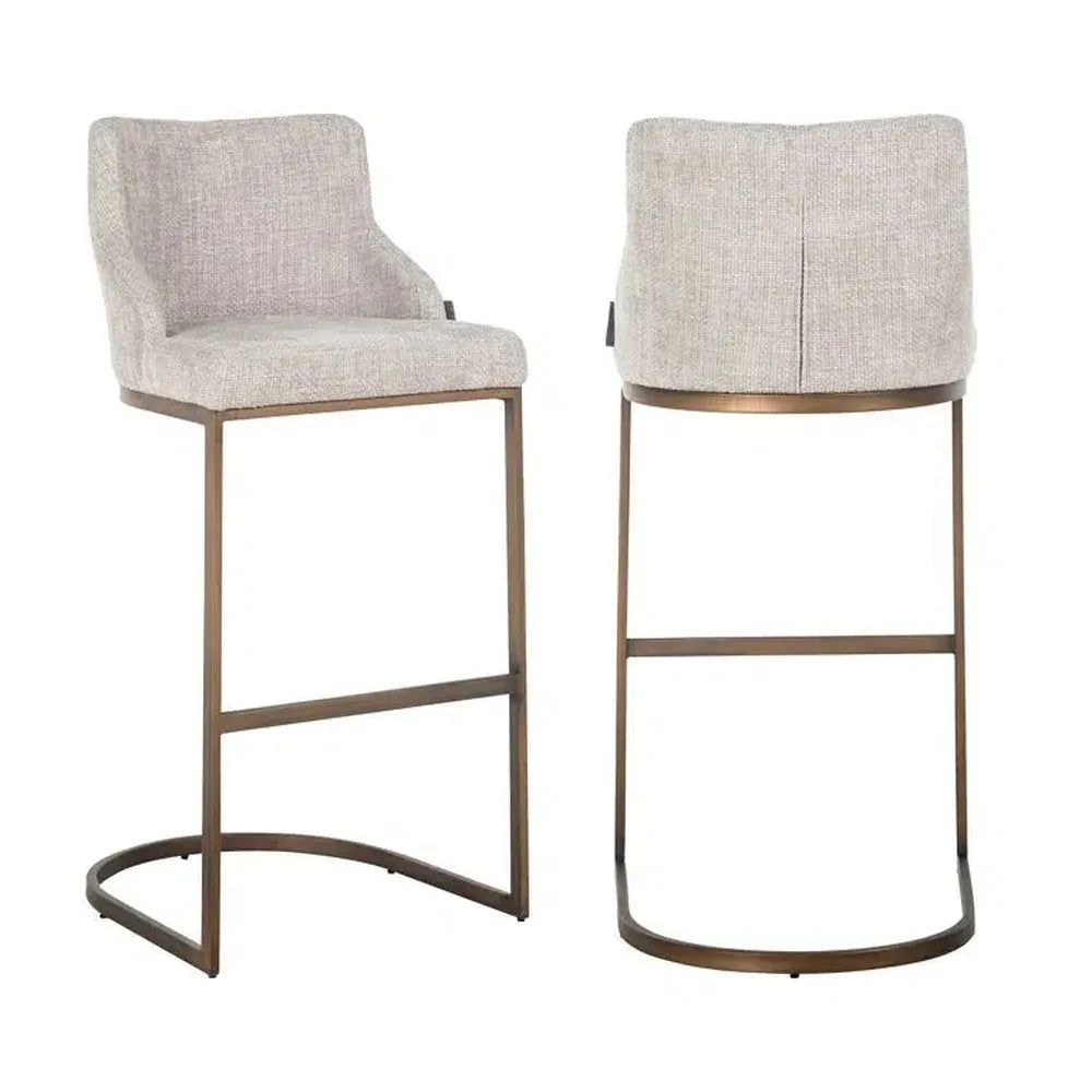 Bolton K Velvet Counter bar stool in stone with a brass-colored frame.
