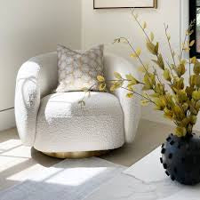Brice low line designer Swivel Chair by Eichholtz-Renaissance Design Studio