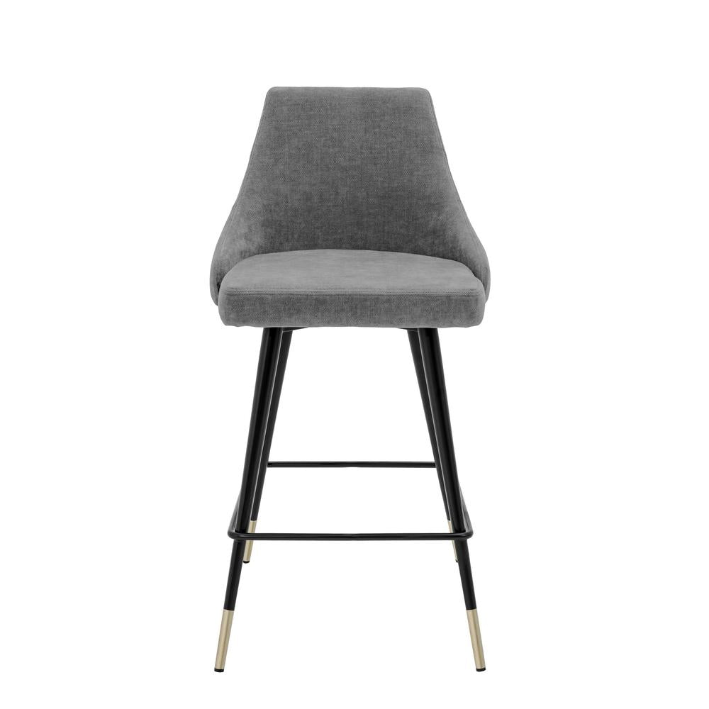 Grey Cedro bar stool by Eichholtz with upholstered seat, black metal legs, and gold-capped feet.