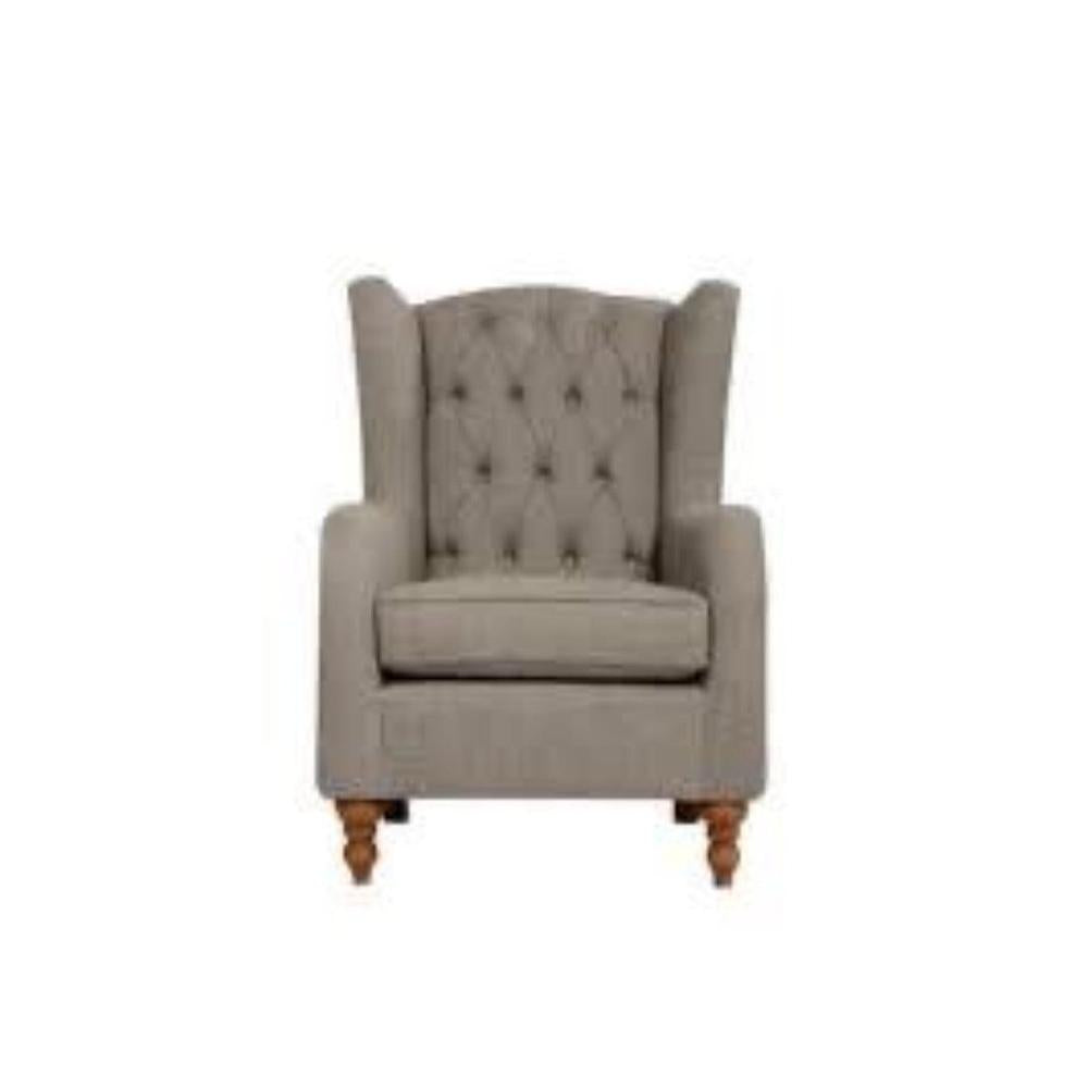 Heather Bespoke Wing Chair in light grey fabric with button tufting and light wood turned feet.
