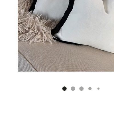 Hugo Bay Ivory cushions with thick fringe