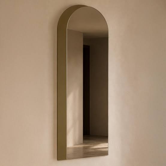 Draven arch mirror in champagne gold by Richmond