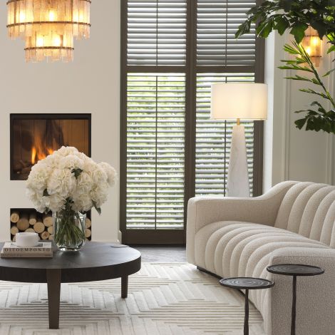 Kelly sofa with ribbed back in boucle by Eichholtz-Renaissance Design Studio