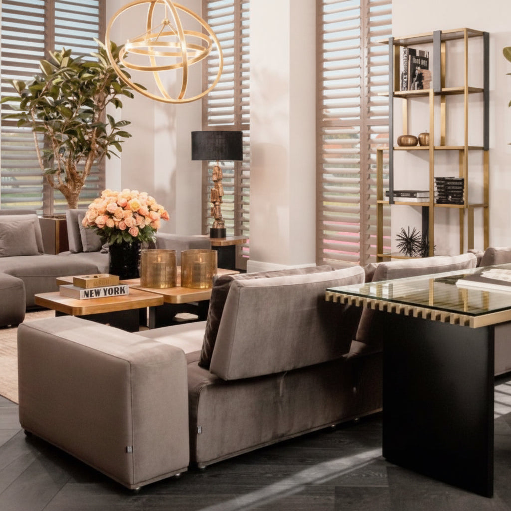 Eichholtz Mondial modular sofa in granite grey polyester, with chaise, in a modern living room.
