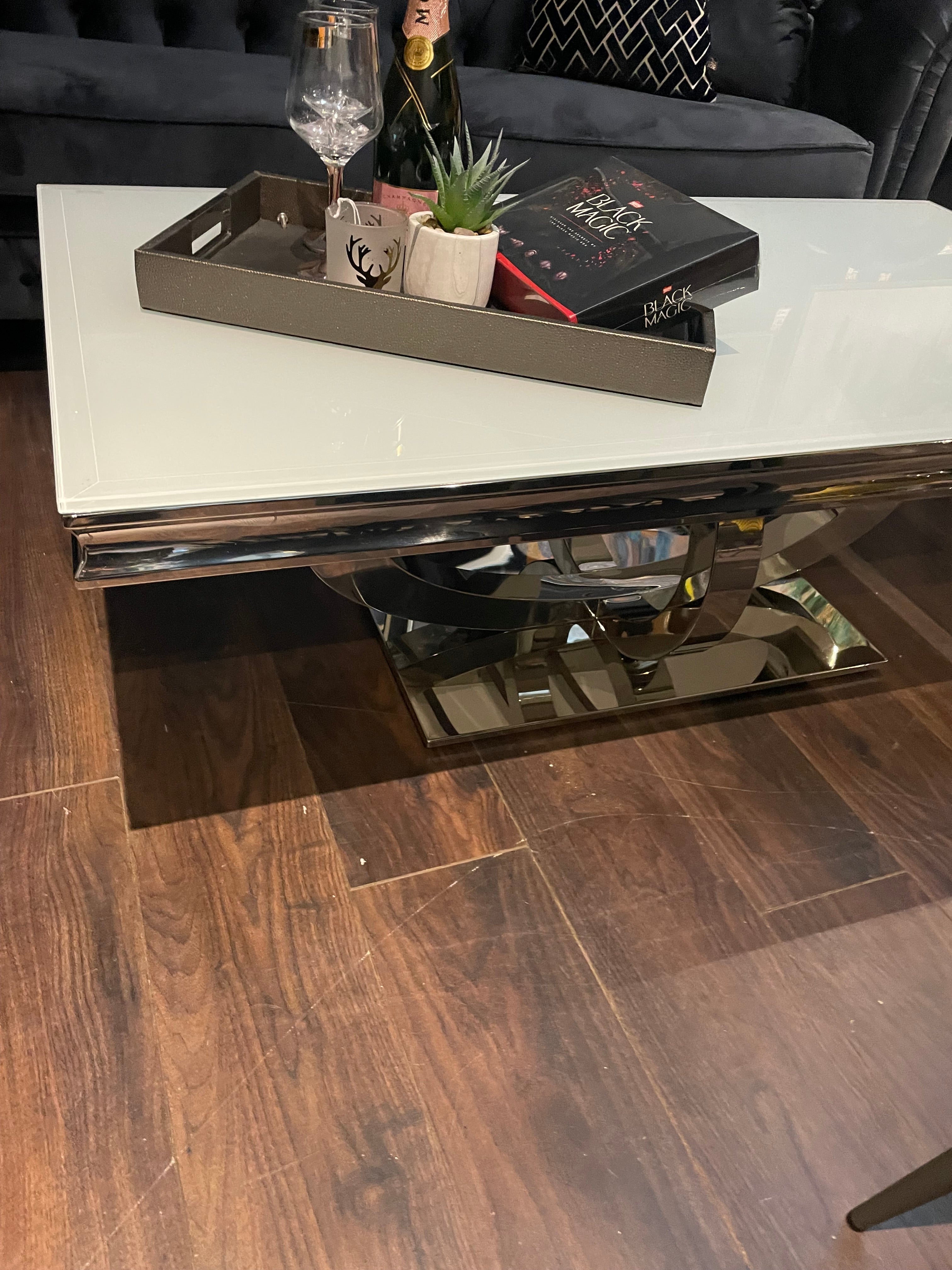 Orion white coffee table with fabulous chrome base clearance reduced Instore only-Renaissance Design Studio