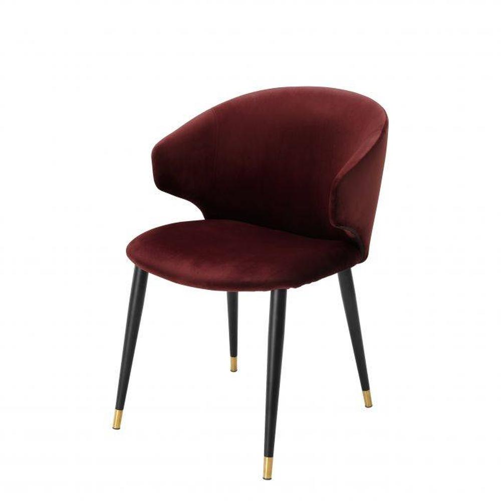 Volante Luxury Dining Chair, Bordeaux velvet upholstery, black tapered legs with brass caps.