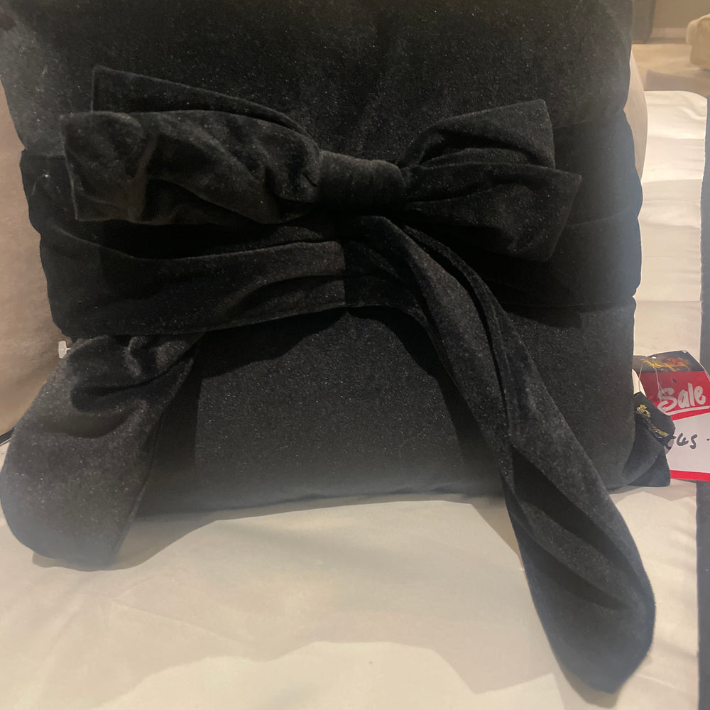 Moneypenny black tied front bow cushions