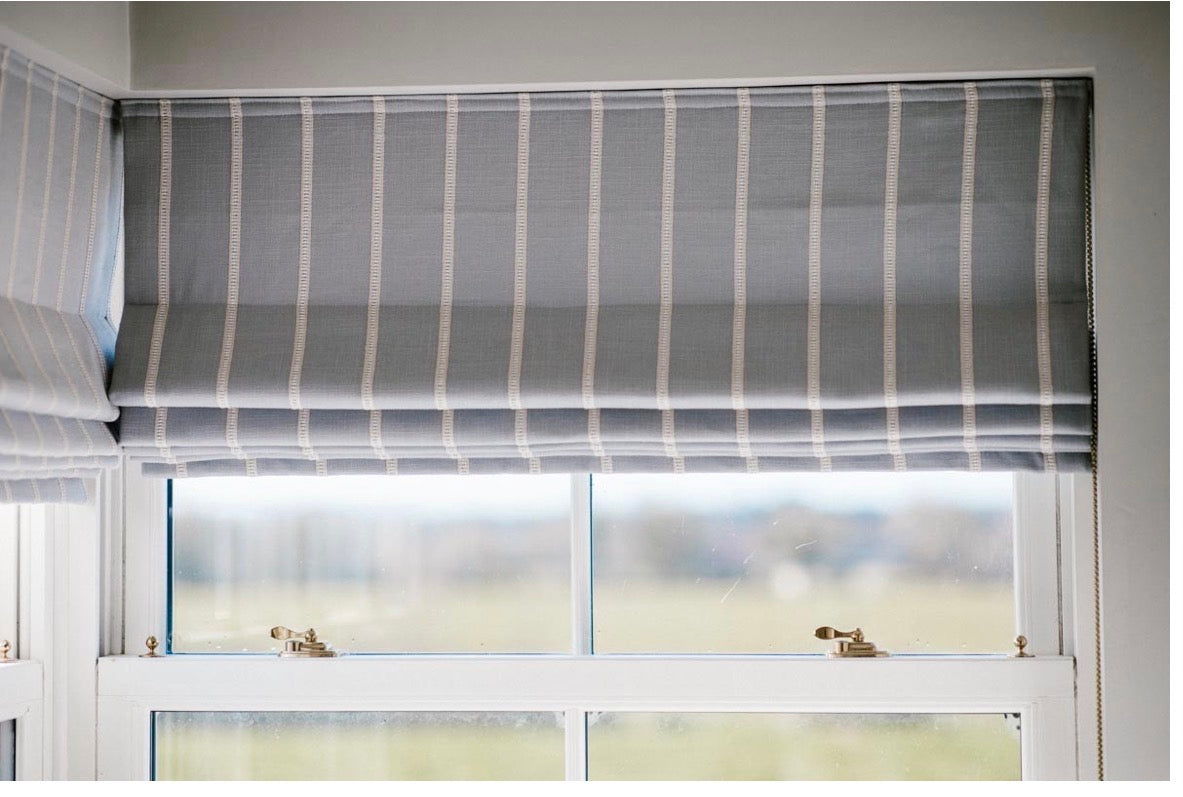 Roman blinds custom designed for you by Renaissance Design Studio