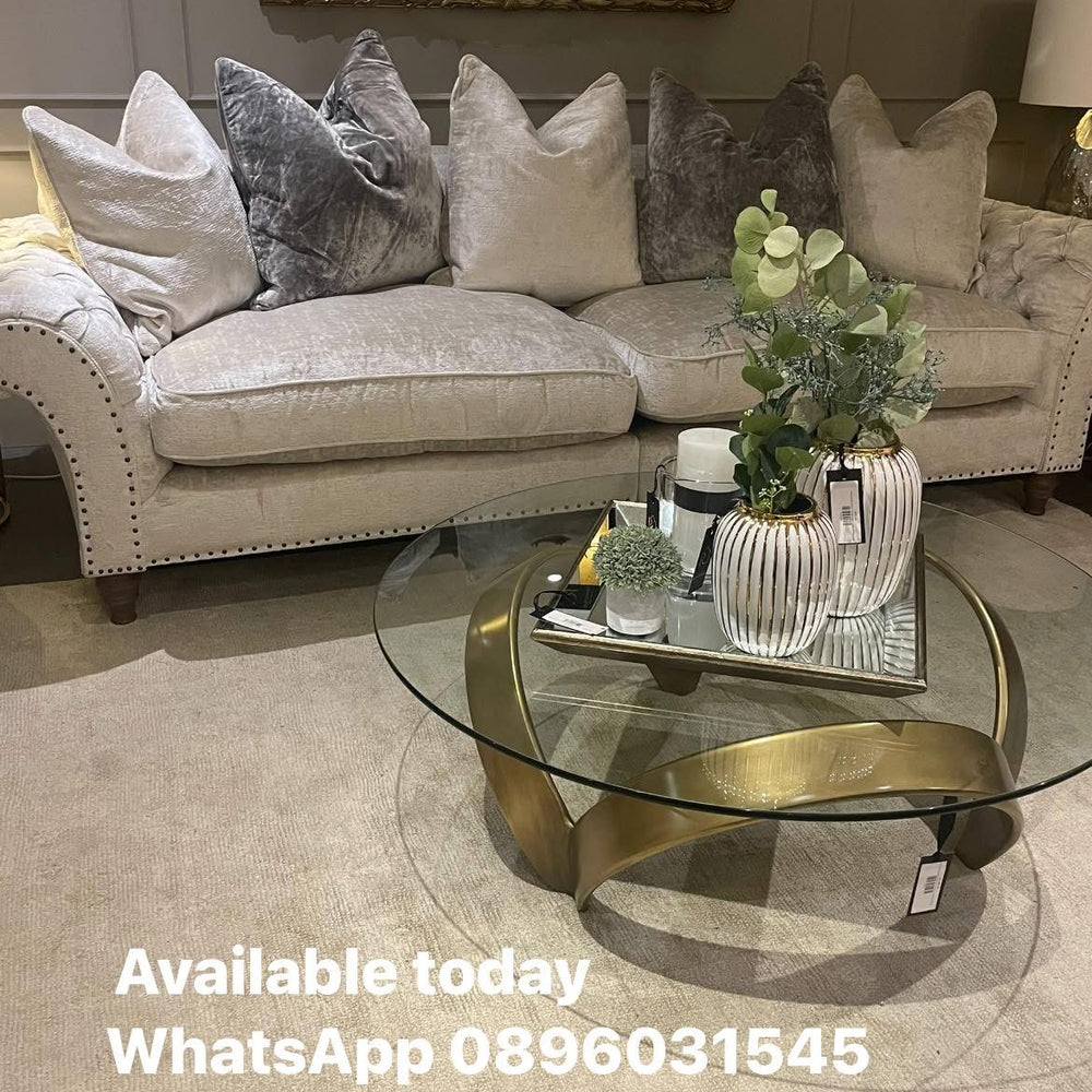 Soquel round coffee table by Eichholtz in vintage brushed brass..