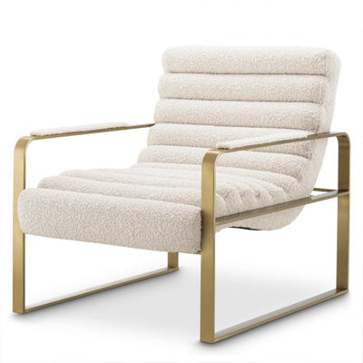 Brushed brass Olsen armchair  by Eichholtz