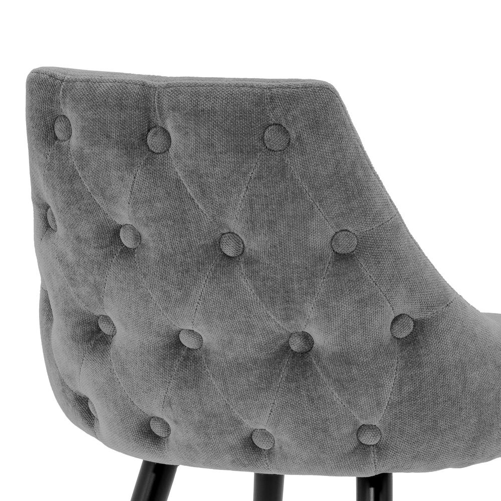 Cedro Stool by Eichholtz, featuring a tufted grey velvet backrest and dark legs.