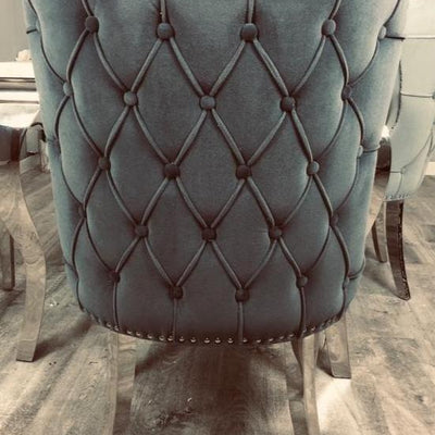 Chanel tufted dining chair w polished legs