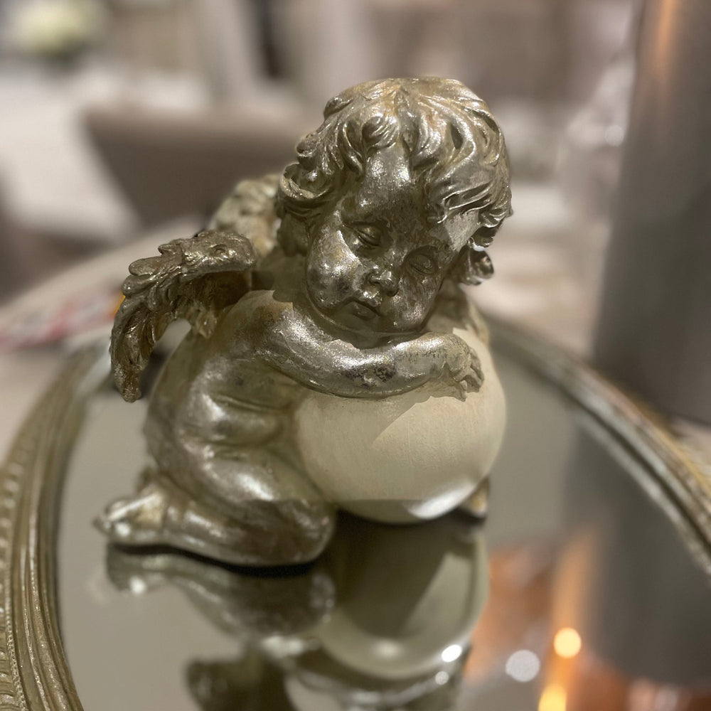 Cherub with white orb reduced