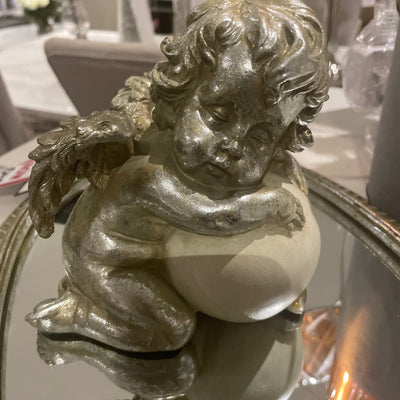 Cherub with white orb reduced