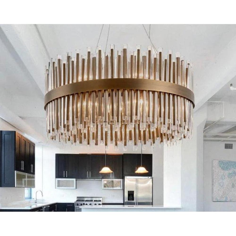 Colmar 80cm chandelier with brushed brass frame and clear glass rods in a modern kitchen.