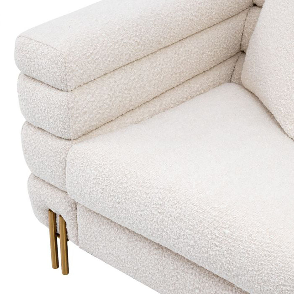 Eichholtz York Sofa with gold accents reduced.