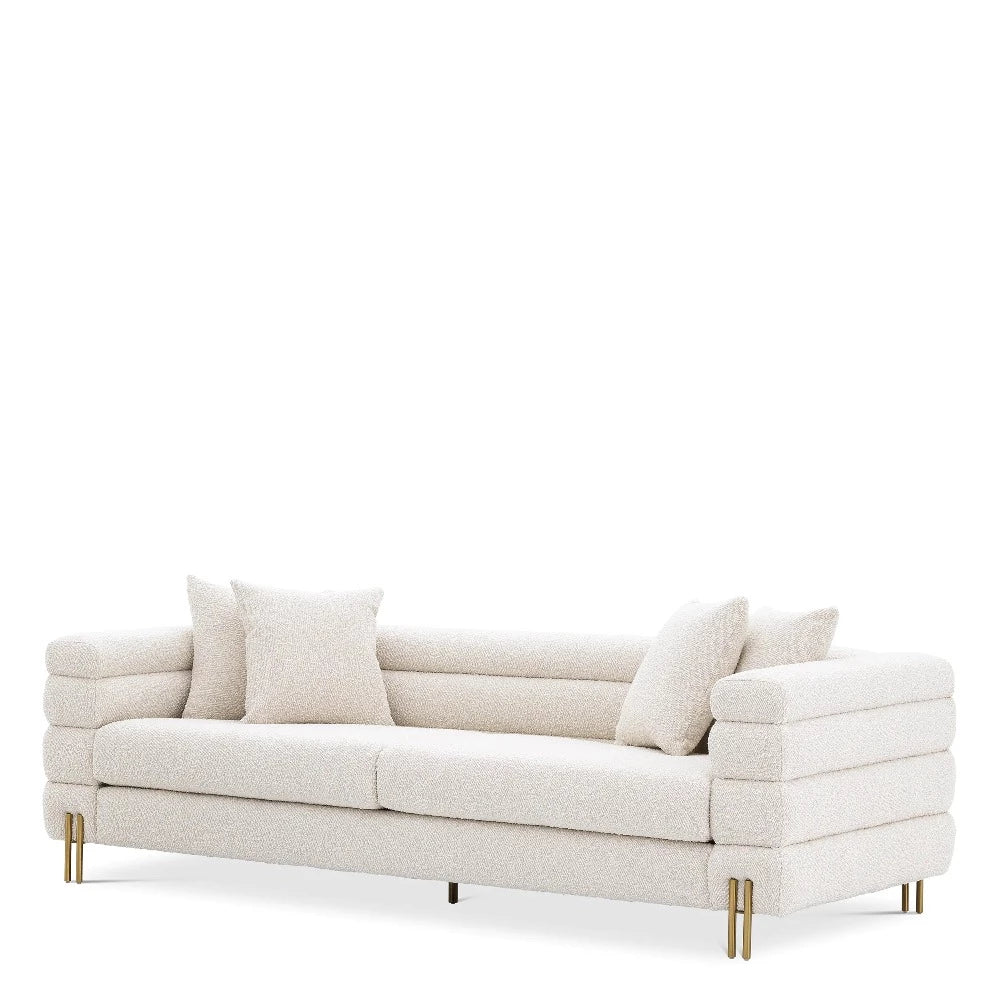 Eichholtz York Sofa with gold accents reduced.