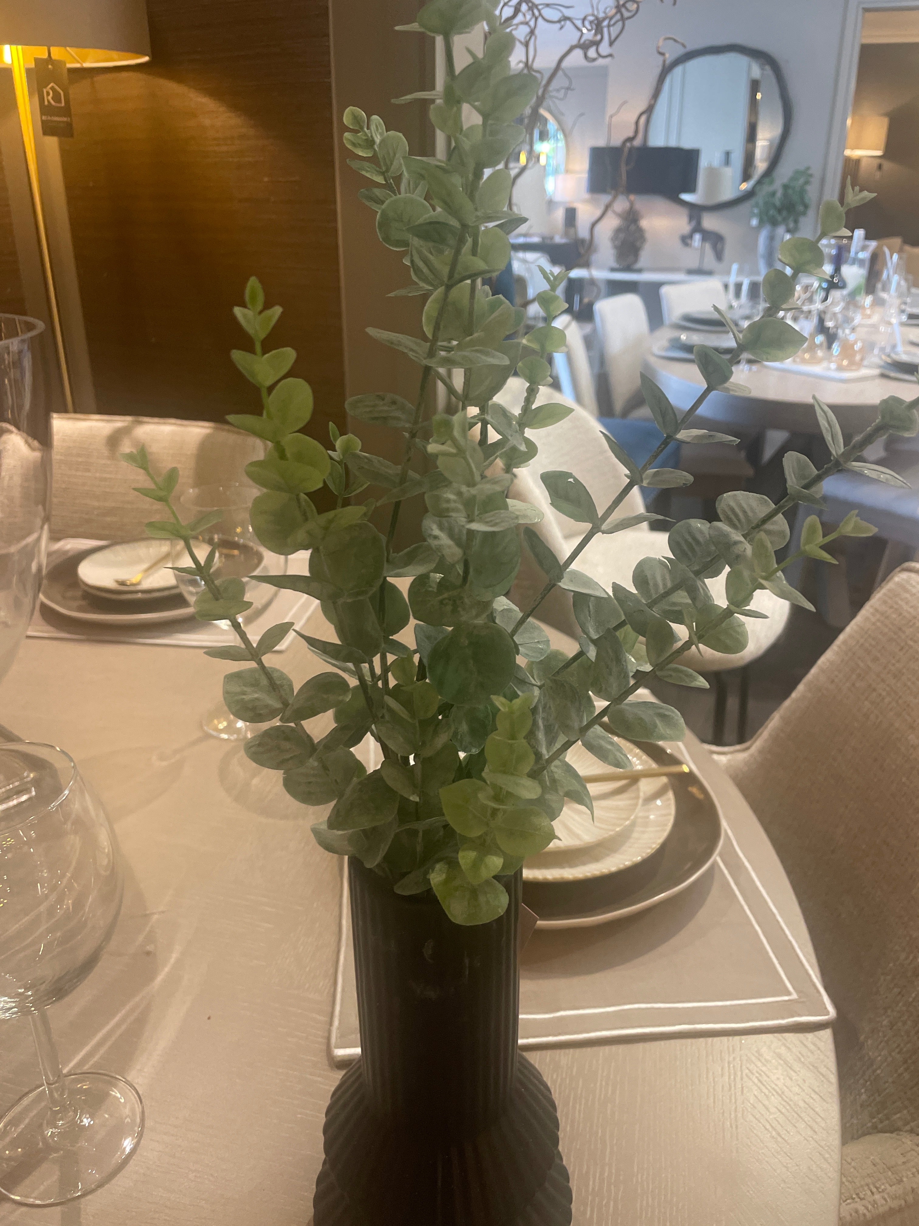 (Fabia Long Vase in Black with eucalyptus stems-Renaissance Design Studio