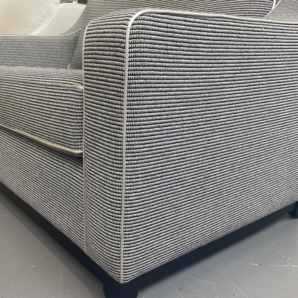 Granada custom  made  sofa on plinth in fabric to select in our studio