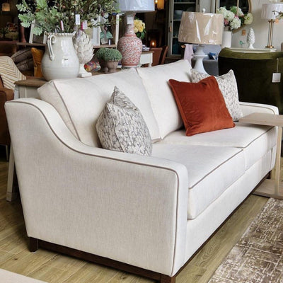 Granada custom  made  sofa on plinth in fabric to select in our studio