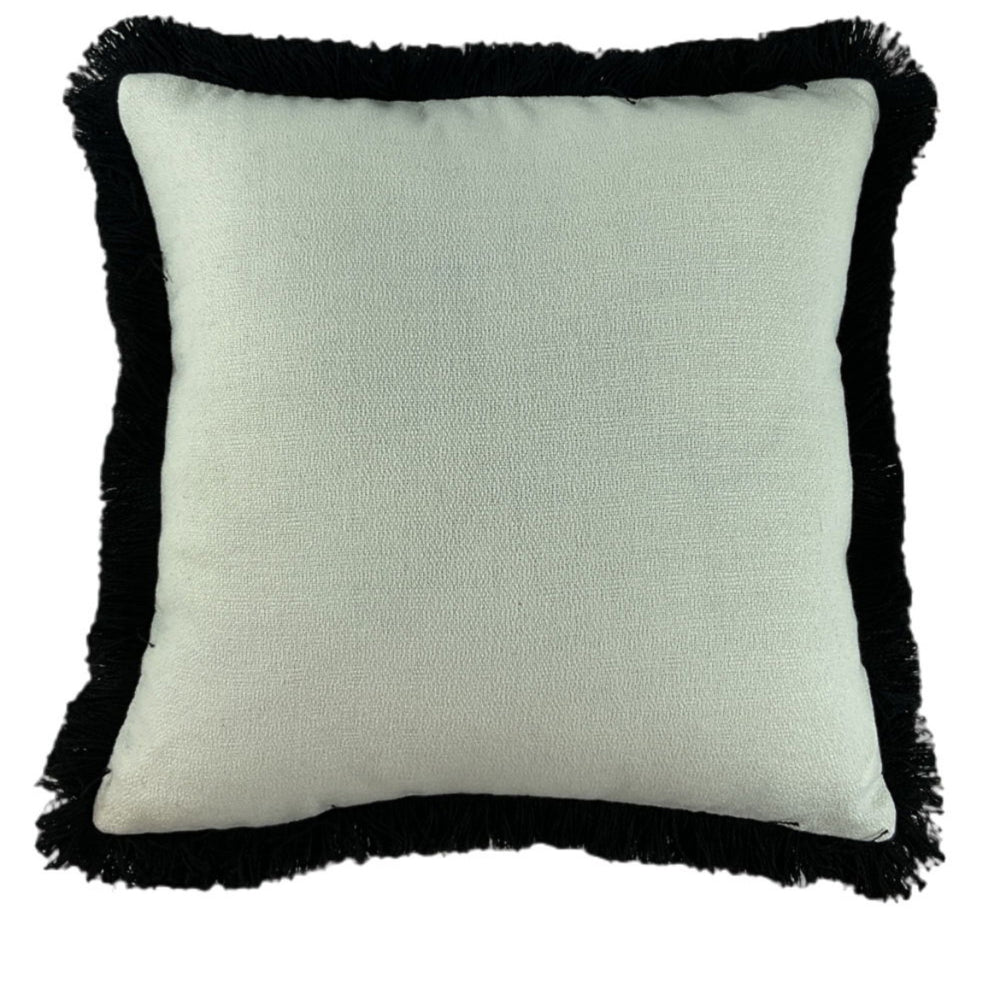 Hugo Bay Ivory cushions with thick fringe