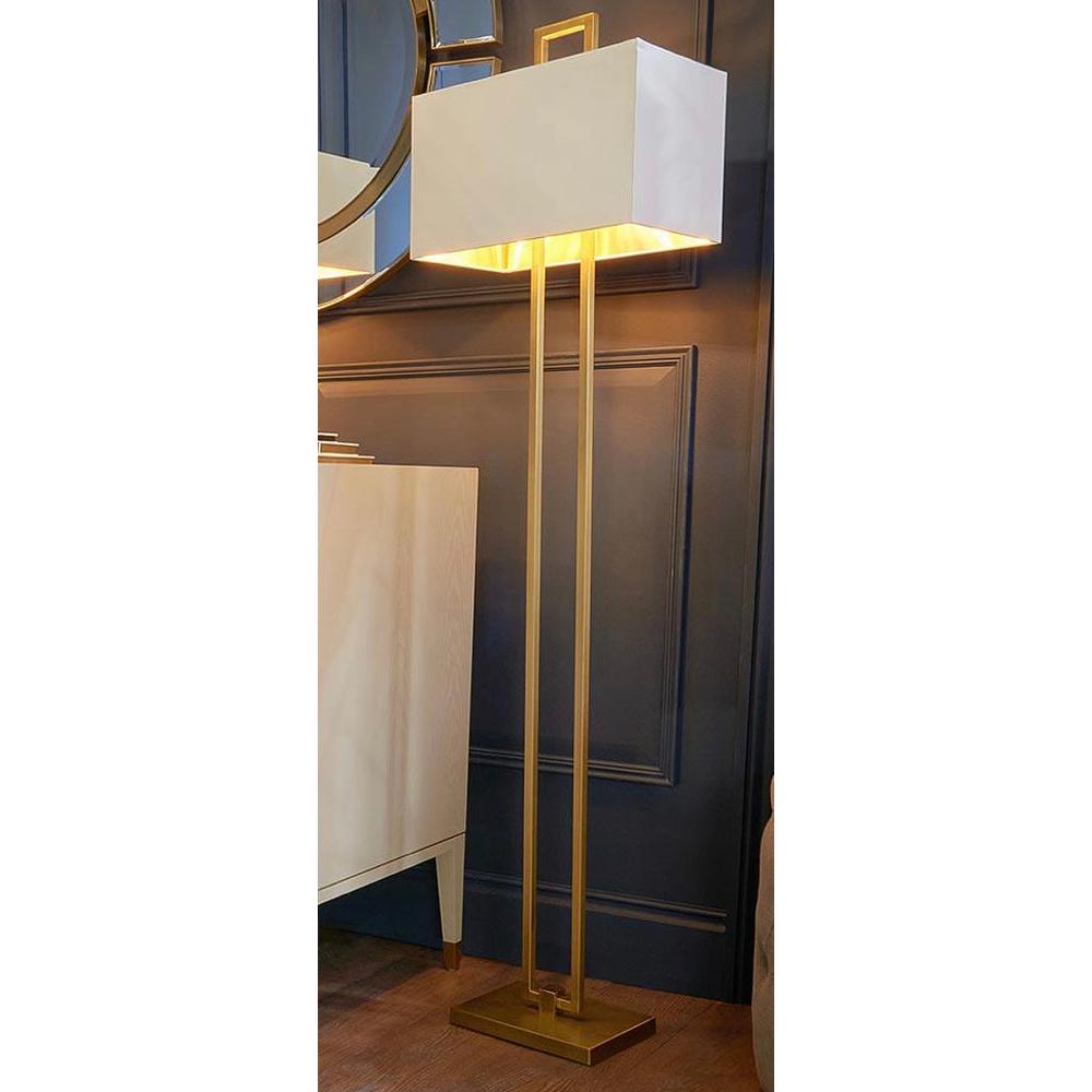 Kensington Danby brass floor lamp with a rectangular white shade, 160cm tall, against a dark paneled wall.