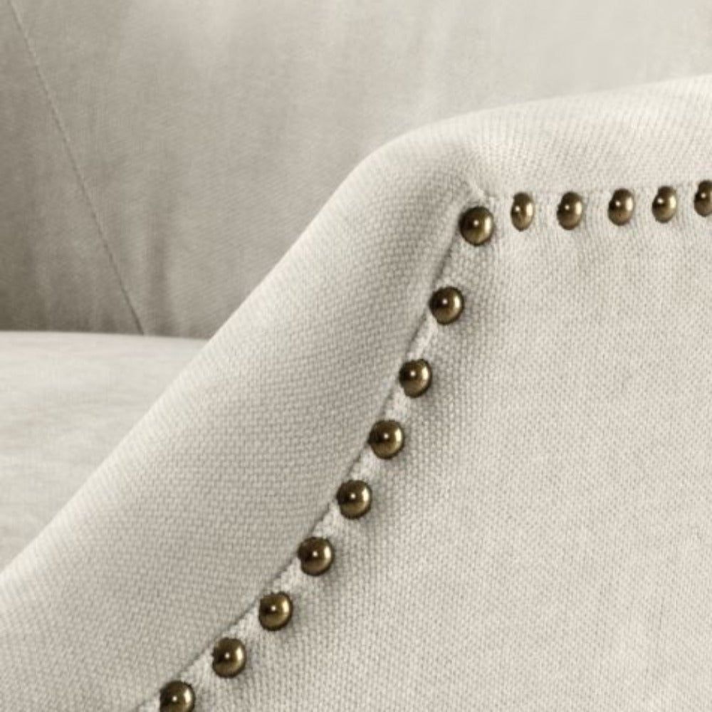 Legacy Dining Chair in Clarck sand with stud detail by Eichholtz-Renaissance Design Studio