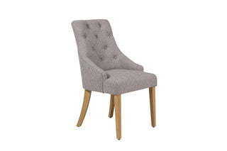 Riviera dining chair in Natural and solid oak legs