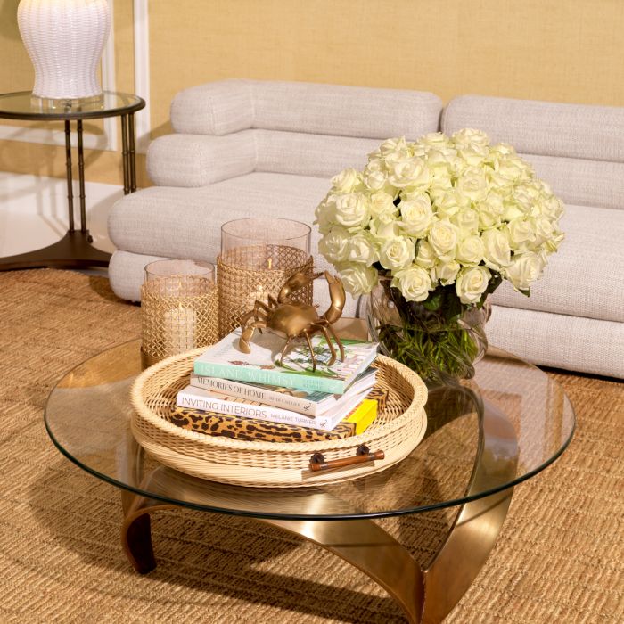 Soquel round coffee table by Eichholtz in vintage brushed brass..